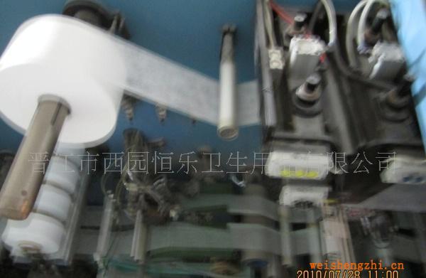 晉江市西園恒樂機(jī)器設(shè)備圖案--衛(wèi)生巾，尿褲生產(chǎn)機(jī)器一角
